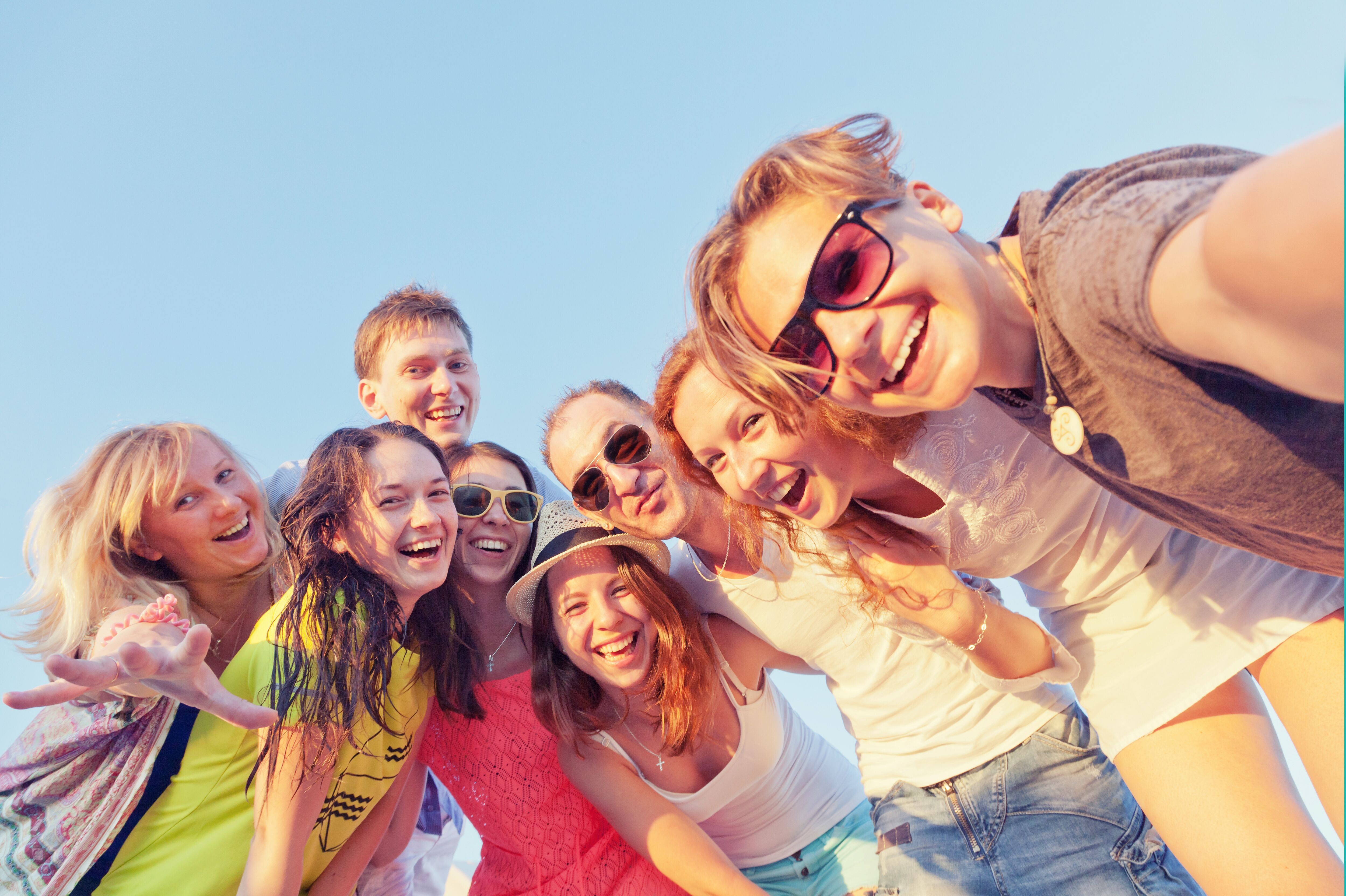 Group picture of happy and smiling people.